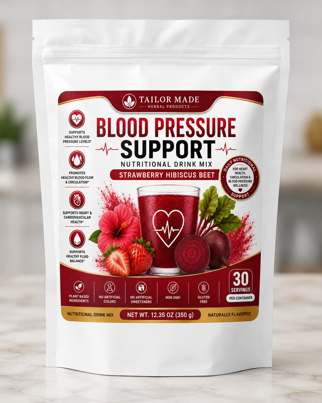 A stand-up pouch of Tailor Made Herbal Products Blood Pressure Support Nutritional Drink Mix in Strawberry Hibiscus Beet flavor, shown on a light marble countertop with a blurred kitchen background.