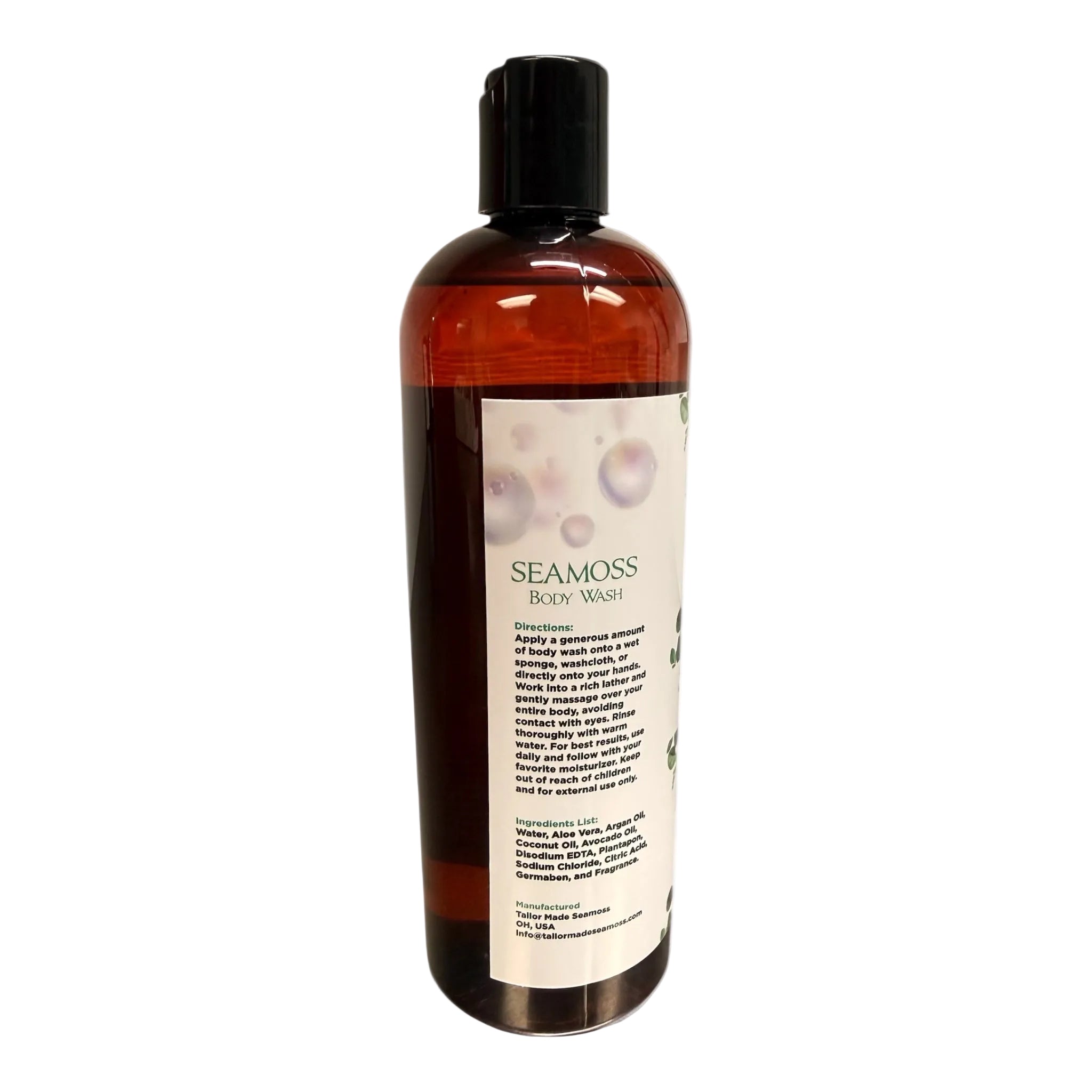 A bottle of Seamoss Body Wash with a black cap and a cream-colored label, shown on a white background with a soft shadow.