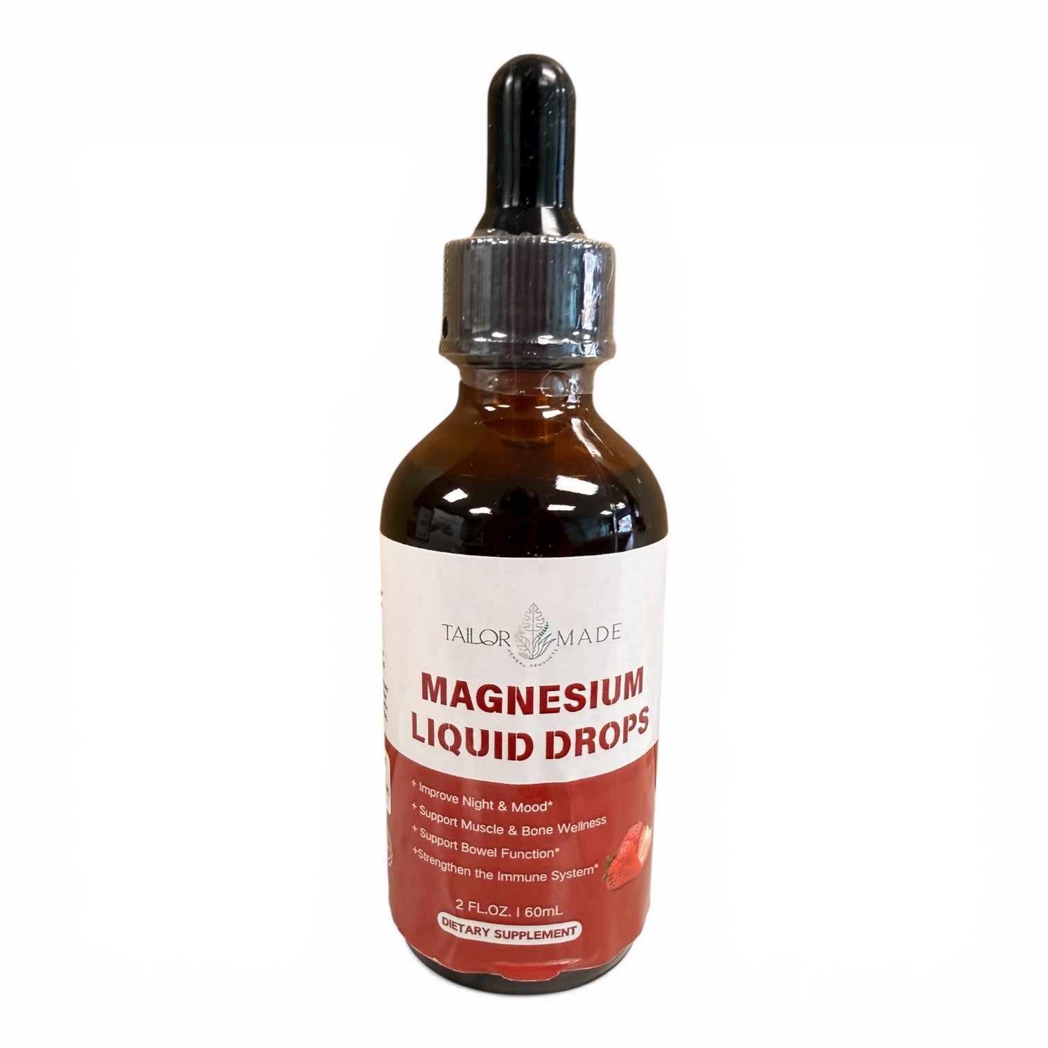 Bottle of magnesium liquid drops with a dropper on a white background